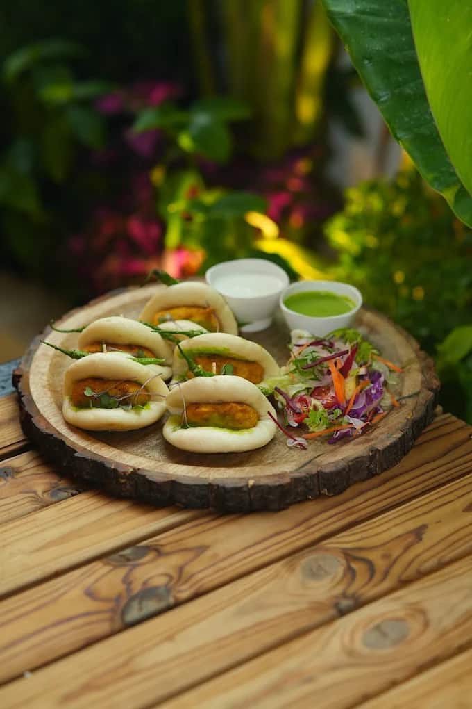 Bao-style stuffed buns platter served outdoors at Terra Cafe & Bistro